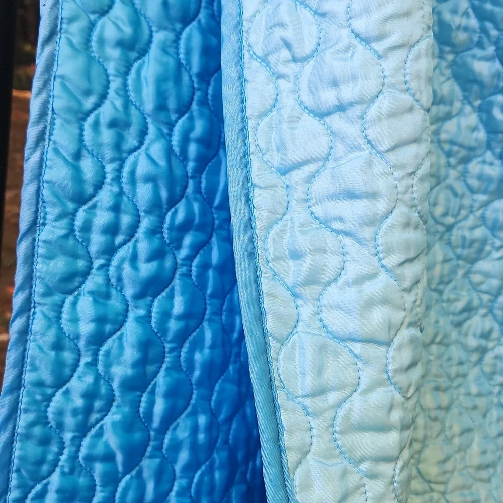 Vintage 1990s blue satin quilted twin size comforter bedspread .